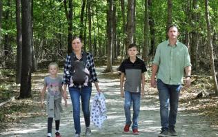Family walking on a trail