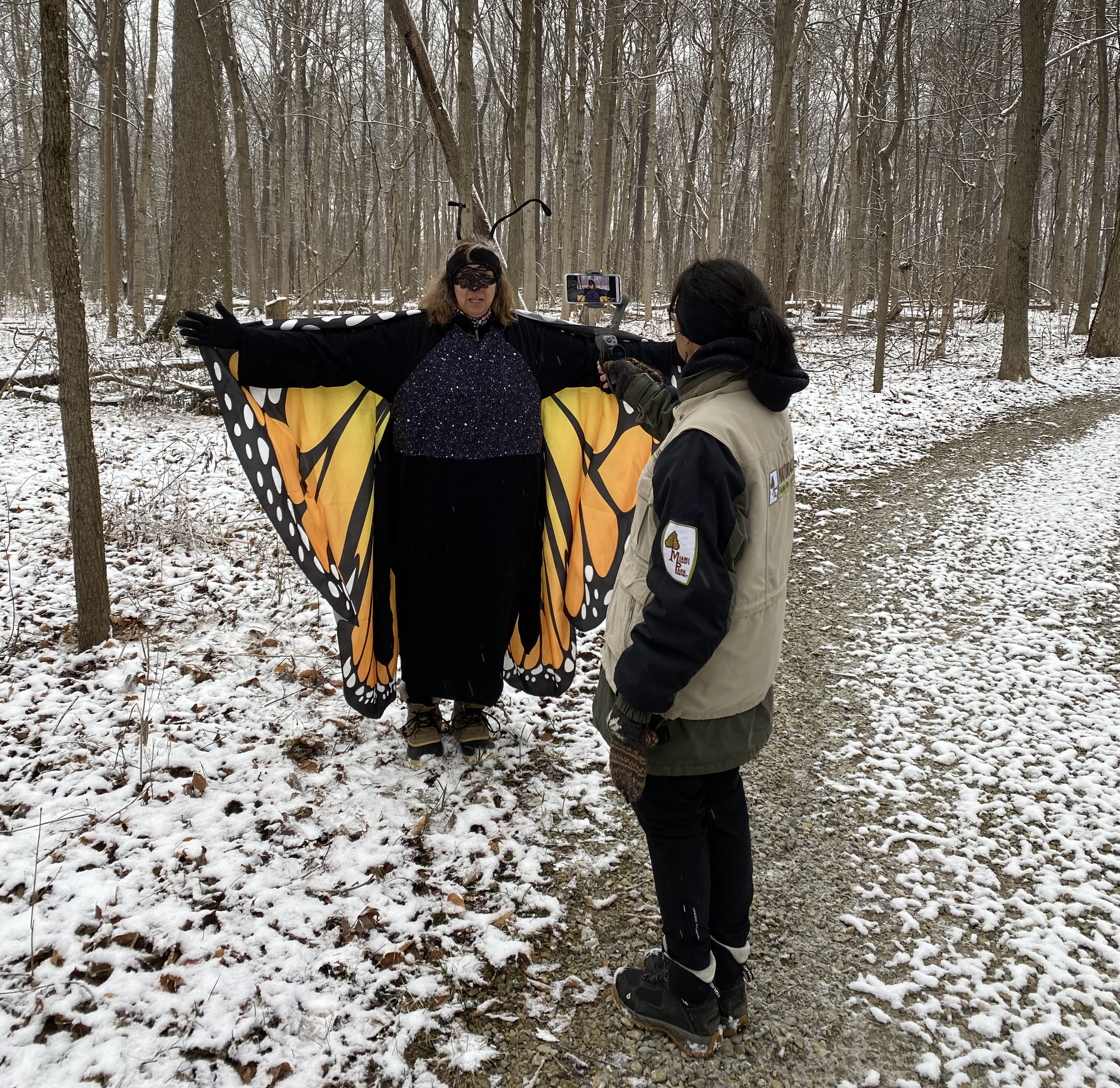 Naturalist dressed as butterfly