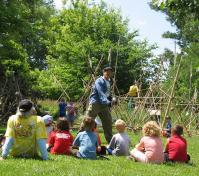 campers listening to a guide