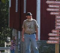 People and a directional sign
