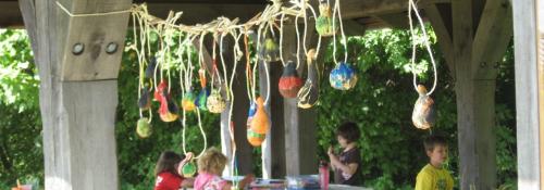 painted gourds hanging from shelter house