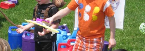 campers at water camp playing with bubbles