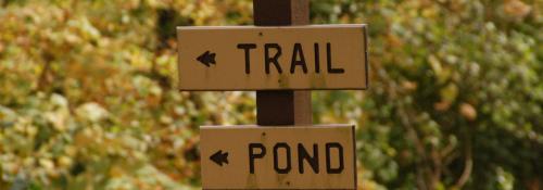 trail and pond sign
