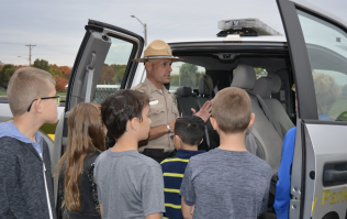 MCPD Ranger talking with children